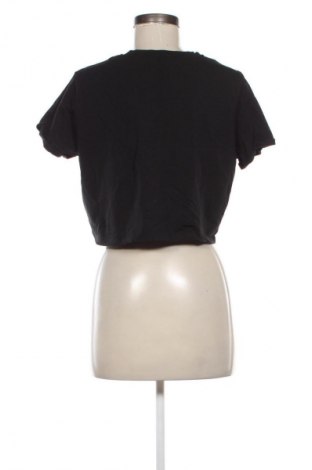 Γυναικείο t-shirt NA-KD, Μέγεθος L, Χρώμα Μαύρο, Τιμή 6,99 €
