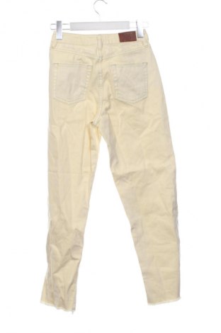 Damskie jeansy BDG, Rozmiar XS, Kolor Żółty, Cena 47,99 zł