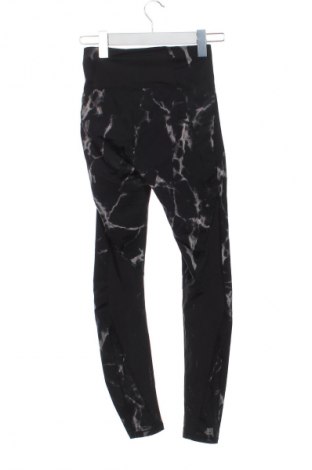 Damskie legginsy Decathlon, Rozmiar XXS, Kolor Kolorowy, Cena 57,99 zł