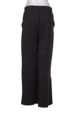 Dámské kalhoty  Bershka, Velikost M, Barva Vícebarevné, Cena  146,00 Kč