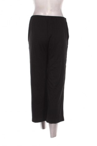 Dámske nohavice Cartoon, Veľkosť L, Farba Čierna, Cena  4,95 €