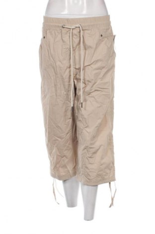 Damskie spodnie Gina, Rozmiar XL, Kolor Beżowy, Cena 53,99 zł