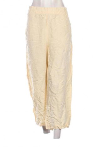 Damskie spodnie H&M, Rozmiar L, Kolor ecru, Cena 49,99 zł