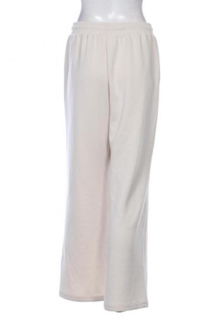 Damskie spodnie Reserved, Rozmiar L, Kolor ecru, Cena 128,60 zł