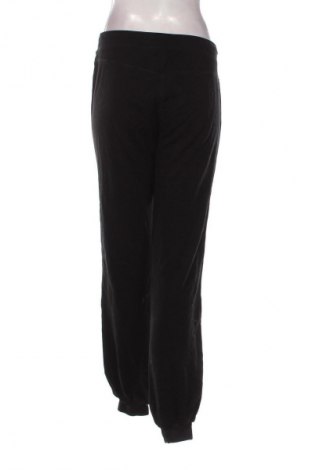 Γυναικείο αθλητικό παντελόνι Nike, Μέγεθος XL, Χρώμα Μαύρο, Τιμή 22,99 €