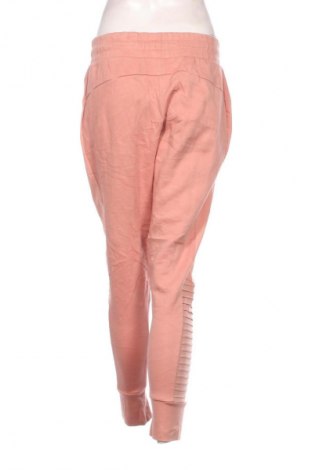 Γυναικείο αθλητικό παντελόνι PUMA, Μέγεθος L, Χρώμα Ρόζ , Τιμή 17,99 €