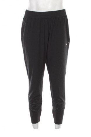 Męskie spodnie sportowe Nike, Rozmiar L, Kolor Czarny, Cena 129,99 zł