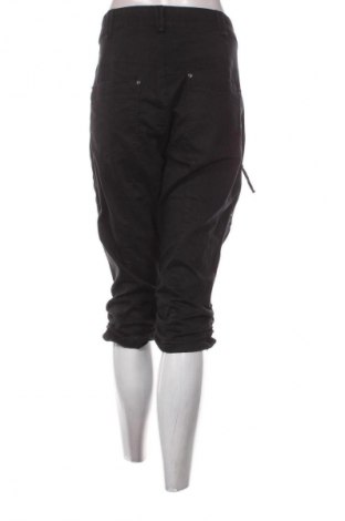 Γυναικείο κοντό παντελόνι Zizzi, Μέγεθος 3XL, Χρώμα Μαύρο, Τιμή 23,99 €
