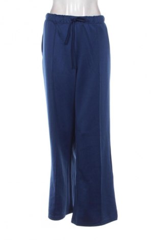 Damskie spodnie True Spirit, Rozmiar L, Kolor Niebieski, Cena 21,99 zł