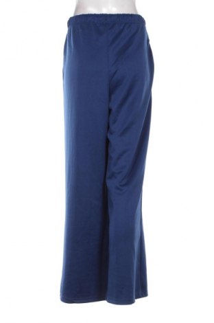 Damskie spodnie True Spirit, Rozmiar L, Kolor Niebieski, Cena 21,99 zł