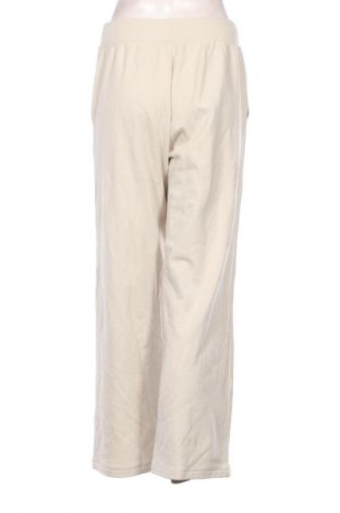 Γυναικείο παντελόνι Uniqlo, Μέγεθος L, Χρώμα  Μπέζ, Τιμή 25,99 €