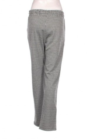 Damskie spodnie United Colors Of Benetton, Rozmiar L, Kolor Kolorowy, Cena 112,53 zł