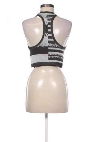 Дамски спортен топ Reebok, Размер L, Цвят Многоцветен, Цена 17,00 €