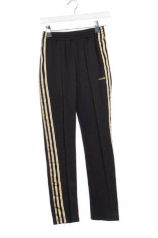 Damskie spodnie sportowe Adidas, Rozmiar XS, Kolor Czarny, Cena 74,99 zł