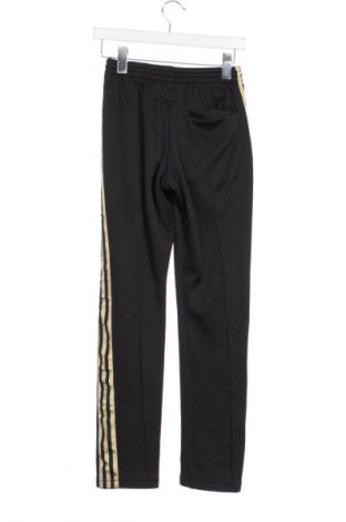 Damskie spodnie sportowe Adidas, Rozmiar XS, Kolor Czarny, Cena 74,99 zł