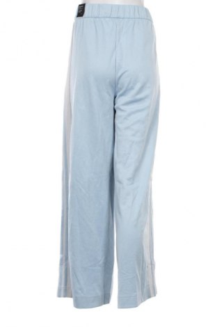 Γυναικείο αθλητικό παντελόνι Adidas, Μέγεθος M, Χρώμα Μπλέ, Τιμή 45,99 €