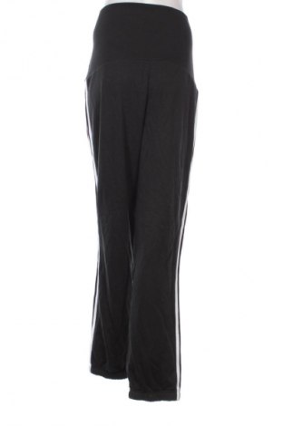 Damskie spodnie sportowe Adidas, Rozmiar L, Kolor Czarny, Cena 250,99 zł