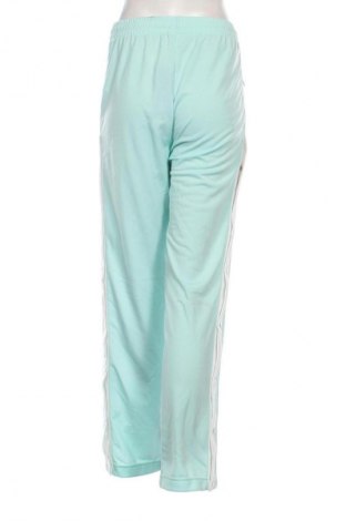 Damskie spodnie sportowe Adidas Originals, Rozmiar L, Kolor Niebieski, Cena 200,99 zł