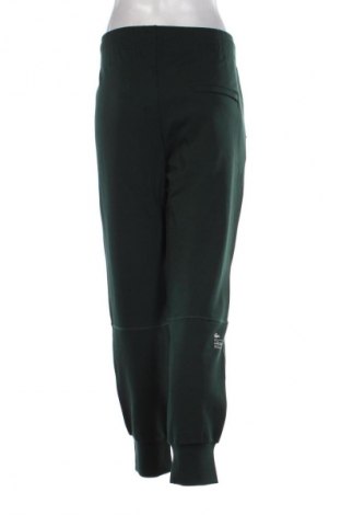 Дамско спортно долнище Lacoste, Размер XL, Цвят Зелен, Цена 75,00 €