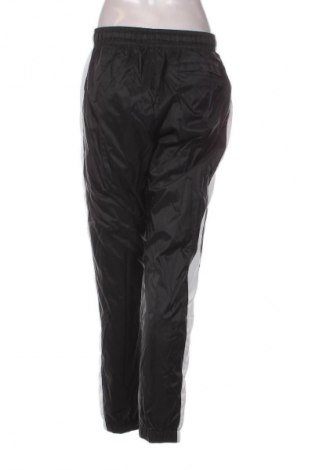 Γυναικείο αθλητικό παντελόνι Nike, Μέγεθος S, Χρώμα Πολύχρωμο, Τιμή 25,99 €