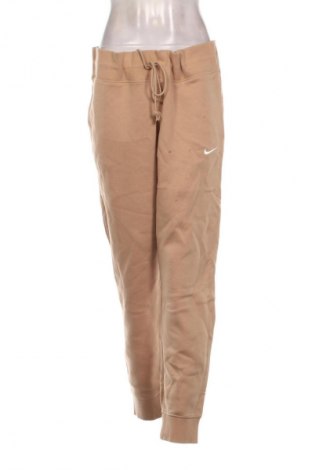 Дамско спортно долнище Nike, Размер XL, Цвят Бежов, Цена 48,06 €