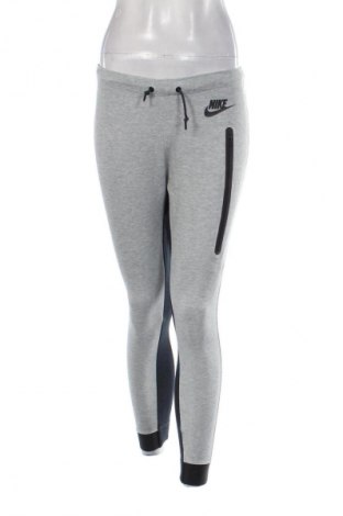 Γυναικείο αθλητικό παντελόνι Nike, Μέγεθος XS, Χρώμα Γκρί, Τιμή 21,00 €