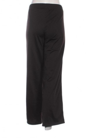 Γυναικείο αθλητικό παντελόνι PUMA, Μέγεθος XL, Χρώμα Μαύρο, Τιμή 19,99 €