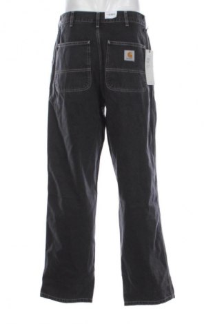 Męskie jeansy Carhartt, Rozmiar M, Kolor Czarny, Cena 422,99 zł