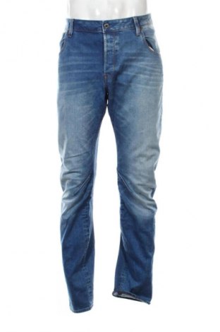 Męskie jeansy G-Star Raw, Rozmiar L, Kolor Niebieski, Cena 254,47 zł