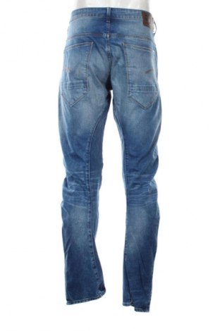 Męskie jeansy G-Star Raw, Rozmiar L, Kolor Niebieski, Cena 254,47 zł