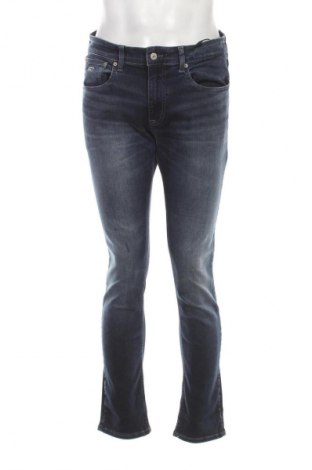 Męskie jeansy Tommy Jeans, Rozmiar M, Kolor Niebieski, Cena 492,99 zł