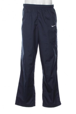 Męskie spodnie Nike, Rozmiar M, Kolor Niebieski, Cena 151,10 zł