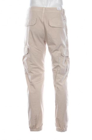 Herrenhose Tommy Jeans, Größe M, Farbe Beige, Preis € 112,99