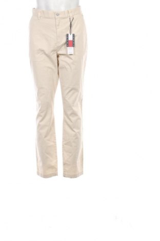 Męskie spodnie Tommy Jeans, Rozmiar XL, Kolor Beżowy, Cena 404,99 zł