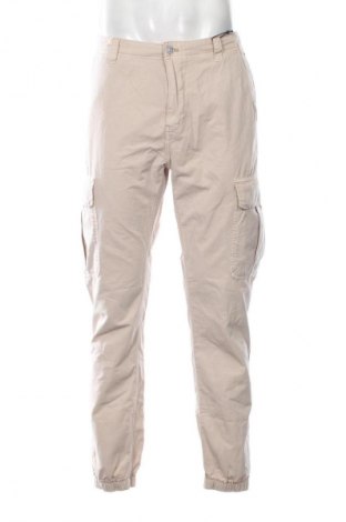 Męskie spodnie Tommy Jeans, Rozmiar L, Kolor Beżowy, Cena 294,99 zł, #135748656