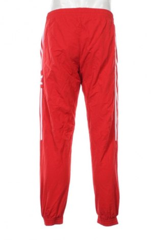 Pantaloni trening de bărbați Adidas Originals, Mărime M, Culoare Roșu, Preț 143,99 Lei
