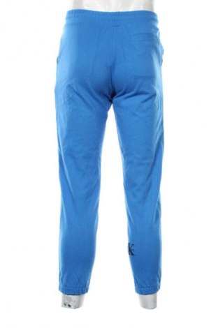 Męskie spodnie sportowe Calvin Klein, Rozmiar S, Kolor Niebieski, Cena 205,57 zł