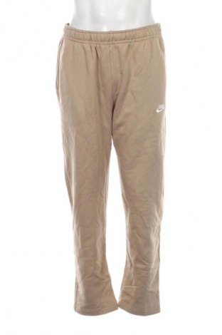 Męskie spodnie sportowe Nike, Rozmiar L, Kolor Beżowy, Cena 129,99 zł