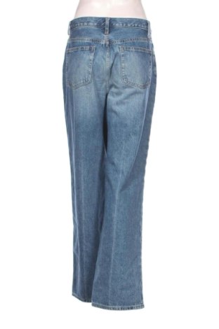 Damskie jeansy Uniqlo, Rozmiar L, Kolor Niebieski, Cena 112,53 zł