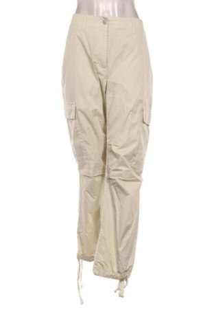 Dámske nohavice Tommy Jeans, Veľkosť L, Farba Béžová, Cena  113,95 €