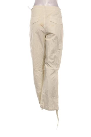 Dámske nohavice Tommy Jeans, Veľkosť L, Farba Béžová, Cena  113,95 €