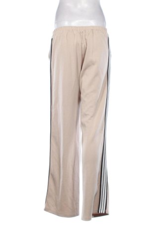 Damskie spodnie Unbranded, Rozmiar M, Kolor ecru, Cena 78,99 zł