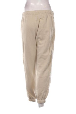 Dámské tepláky Nike, Velikost S, Barva Béžová, Cena  592,00 Kč