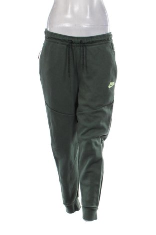 Дамско спортно долнище Nike, Размер L, Цвят Зелен, Цена 21,47 €