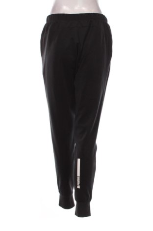 Γυναικείο αθλητικό παντελόνι PUMA, Μέγεθος L, Χρώμα Μαύρο, Τιμή 25,99 €
