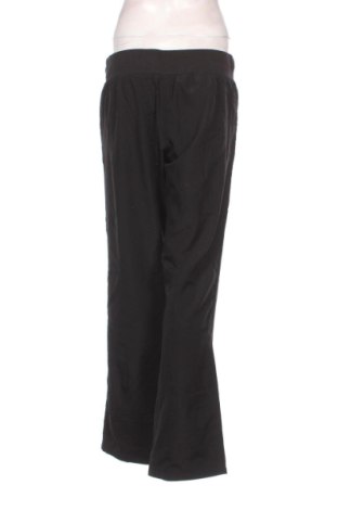 Γυναικείο αθλητικό παντελόνι PUMA, Μέγεθος L, Χρώμα Μαύρο, Τιμή 21,99 €