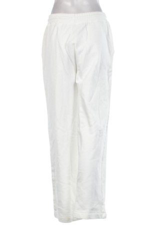 Дамско спортно долнище Tommy Jeans, Размер M, Цвят Бял, Цена 130,37 €