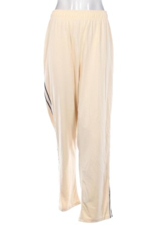 Дамско спортно долнище Unbranded, Размер 3XL, Цвят Бежов, Цена 15,33 €