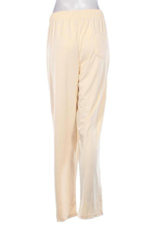 Дамско спортно долнище Unbranded, Размер 3XL, Цвят Бежов, Цена 15,33 €