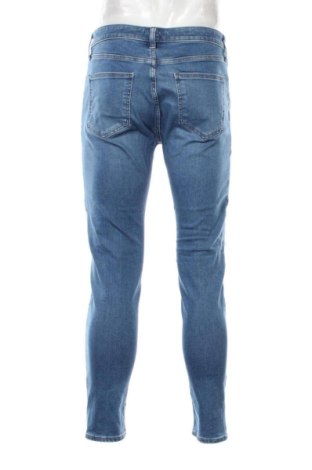 Męskie jeansy Uniqlo, Rozmiar L, Kolor Niebieski, Cena 129,99 zł